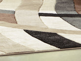 J&M Furniture - Ashley Furniture - Jacinth 6'6" x 9'6" Rug - 6'6" x 9'6" Rug - R402921